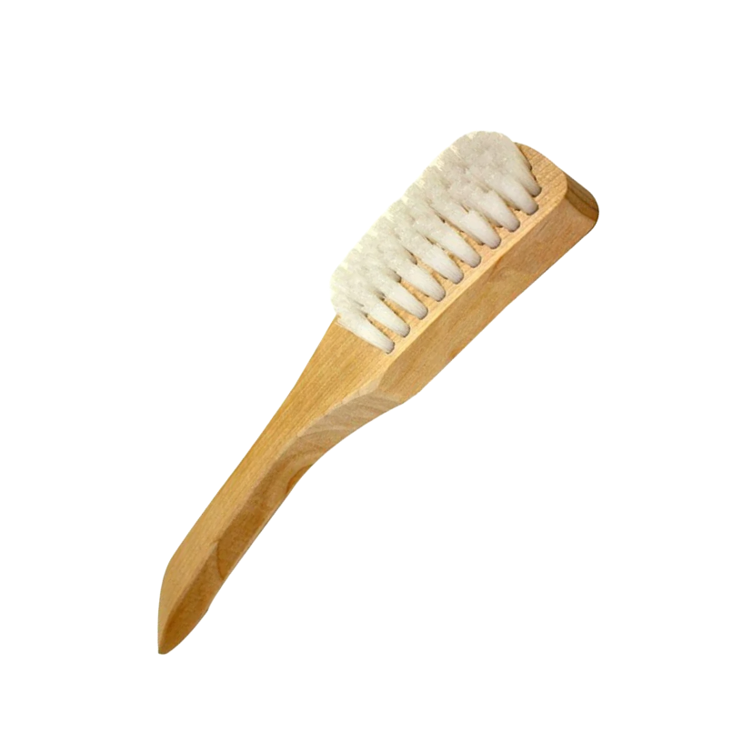 Wooden brush with white bristles on a white background